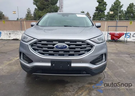2021 Ford Edge Titanium z USA, uszkodzony, nr VIN 2FMPK4K9XMBA53607